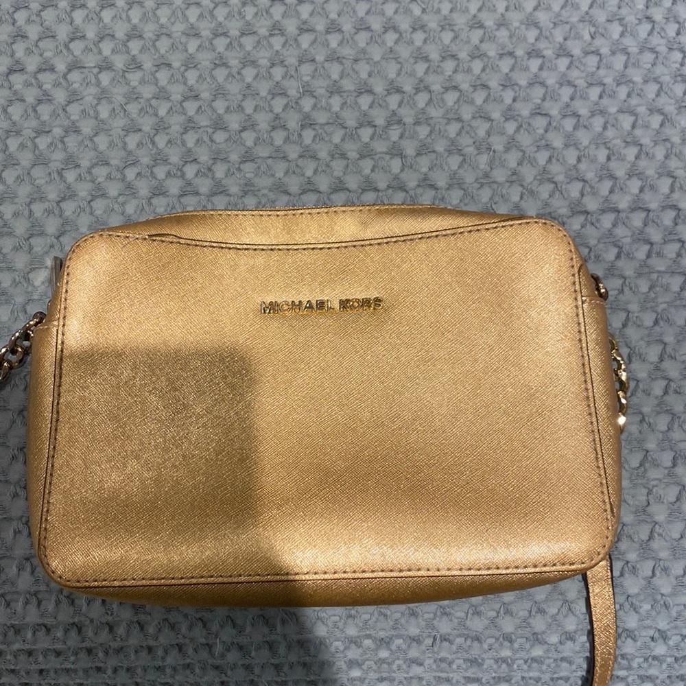 Micheal Kors gold purse